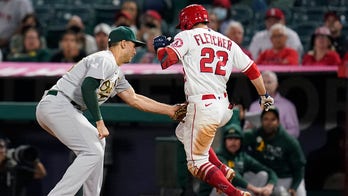 A's keep pace in wild-card race with 5-4 win over Angels