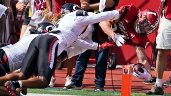 Ridder helps No. 8 Bearcats rally for 38-24 win at Indiana