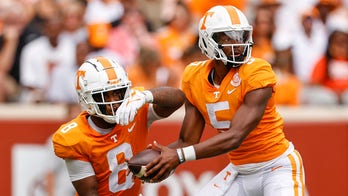 Hooker in on 4 TDs, leads Tennessee to easy win, 56-0
