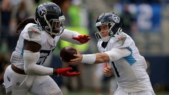 King Henry leads Titans' late rally to stun Seahawks 33-30