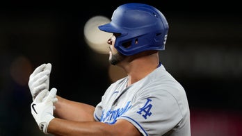 Pujols hit in 10th, Dodgers beat Rox, stay close in NL West