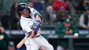 Haniger hits 2 HRs, M's beat A's to gain in wild-card race