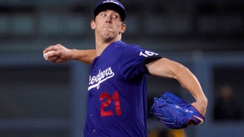 Buehler earns career-high 15th win, Dodgers beat Padres 2-1