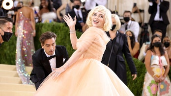 Met Gala 2021: A look at the stars' red carpet outfits