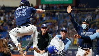 Phillips homers in 10th as Rays rally to beat Tigers 7-4