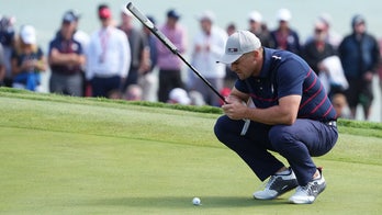 Bryson DeChambeau stares down Europe Ryder Cup team after having to hole out
