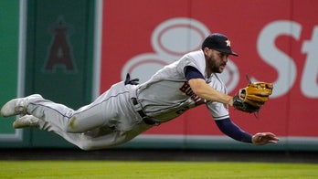 Astros move closer, beat Angels in 12; Ohtani out at plate