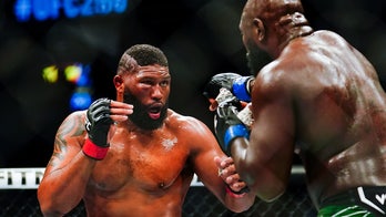 Curtis Blaydes battles through nasty facial cut to win UFC 266 fight