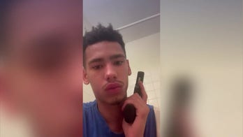 Video shows Daunte Wright posing with gun in woman's bathroom before robbery