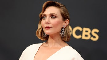 Elizabeth Olsen hits Emmys red carpet in dress designed by sisters Mary-Kate and Ashley Olsen