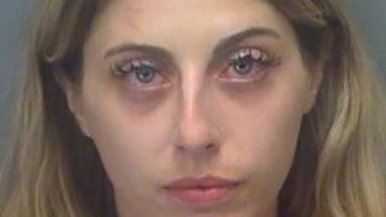 Naked woman, 28, drives golf cart into Florida standoff scene with armed suspect: reports