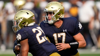 Notre Dame's Jack Coan gets finger popped back into place, throws game-winning TD pass
