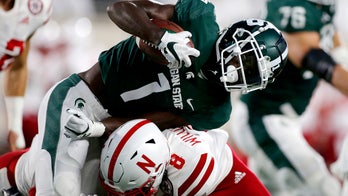 OT interception lifts No. 20 Spartans over Nebraska 23-20