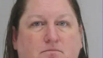 Dallas woman charged in alleged murder-for-hire plot on American Airlines exec husband, feds say