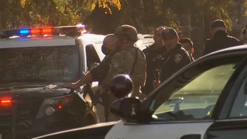 California police officer shot; barricaded armed suspect surrenders