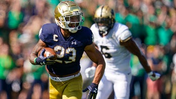 Kelly ties Rockne as No. 12 Irish hold off Boilermakers