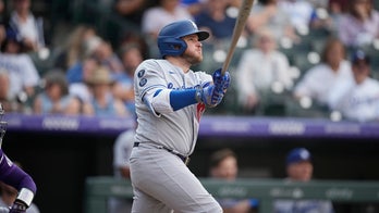 Muncy homers in 10th, Dodgers rally for 7-5 win over Rockies