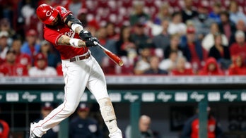 Reds beat Nationals 8-7 in 11 but fall further behind Cards