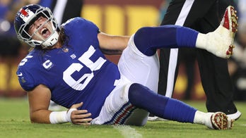 Giants' Nick Gates leaves game on cart after suffering gruesome leg injury