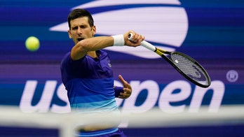 Djokovic tops teen 'Ruuune!' at US Open in calendar Slam bid