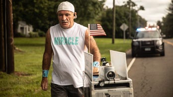 Former flight attendant pushing beverage cart to honor 9/11 victims arrives at Ground Zero