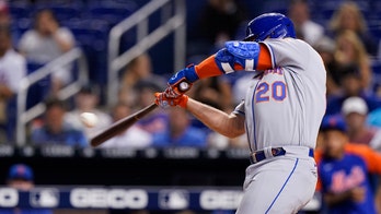 Alonso homers twice, including 100th, as Mets top Marlins