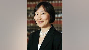 Biden's pick for Comptroller of the Currency blasted over past pro-communism remarks