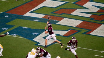Aggie yell leader reminds fans not to shout vulgar language