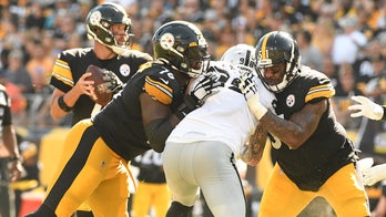 Steelers' Mike Tomlin defends Trai Turner after ejection: 'Somebody spit in his face'