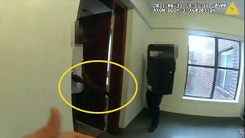 DC police release body camera video of officer fatally shooting man seen wielding long gun on balcony