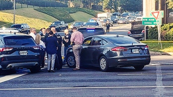 Georgia man armed with bow and arrow carjacks woman in Atlanta, shot by officer during standoff: police