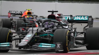 Lewis Hamilton wins record 100th F1 Grand Prix at wet and wild Russia race