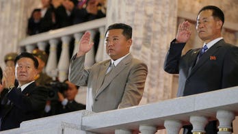 North Korea, slimmed-down Kim Jong Un, enjoy toned-down parade