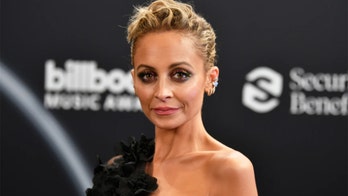Nicole Richie stuns in golden gown for glamorous solo holiday shoot: 'My family forgot'