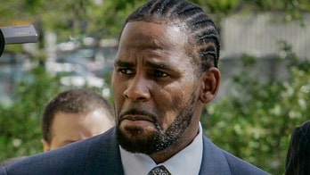 Woman accuses R. Kelly of abusing her 'hundreds' of times before she turned 18