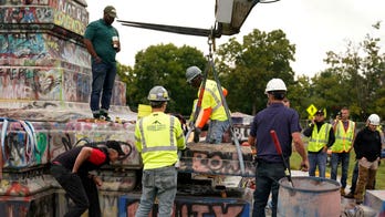 Crews searching for Confederate statue's 1887 time capsule