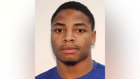 Georgia man accused of shooting into crowd and wounding 7 turns himself in