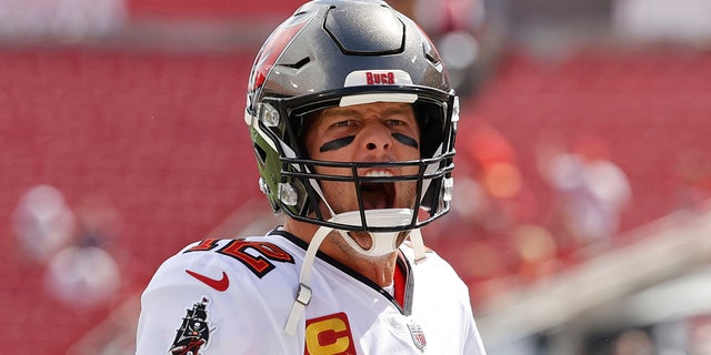 Tampa Bay Buccaneers quarterback Tom Brady (12) warms up before the game against the Atlanta Falcons at Raymond James Stadium on September 19, 2021. 