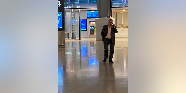 McAuliffe seen in New York Penn Station's Moynihan Train Hall without a face mask. Federal mask mandates require face coverings on public transportation and in all public transportation hubs including airports and train stations. 