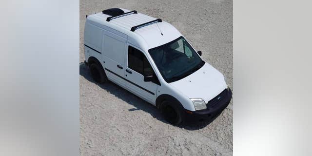 The couple converted this 2012 Ford white van into a camper while on Florida earlier this year. (Joey Petito)