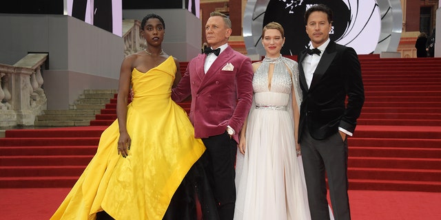 (L to R) Lashana Lynch, Daniel Craig, Lea Seydoux and director Cary Fukunaga attend the world premiere of 'No Time To Die.'