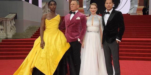 (L to R) Lashana Lynch, Daniel Craig, Lea Seydoux and director Cary Fukunaga attend the world premiere of 'No Time To Die.'