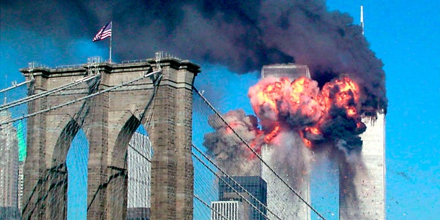 The second tower of the World Trade Center bursts into flames after being hit by a hijacked airplane in New York City in this Sept. 11, 2001 file photograph.