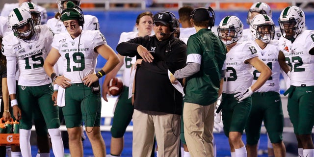 Sep 14, 2019; Boise, ID, USA; Portland State Vikings head coach Bruce Barnum (black coat) during the second half of play against the Boise State Broncos at Albertsons Stadium. Boise State defeats Portland State 45-10. Mandatory Credit: Brian Losness-USA TODAY Sports