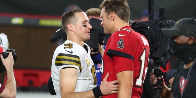 New Orleans Saints quarterback Drew Brees (9) and Tampa Bay Buccaneers quarterback Tom Brady (12) greet after the game at Raymond James Stadium.