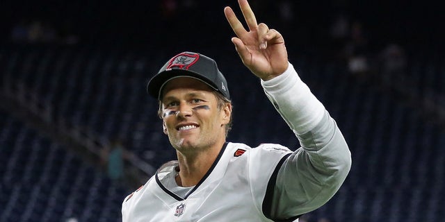 Tampa Bay Buccaneers quarterback Tom Brady waves after a game against the Houston Texans at NRG Stadium.