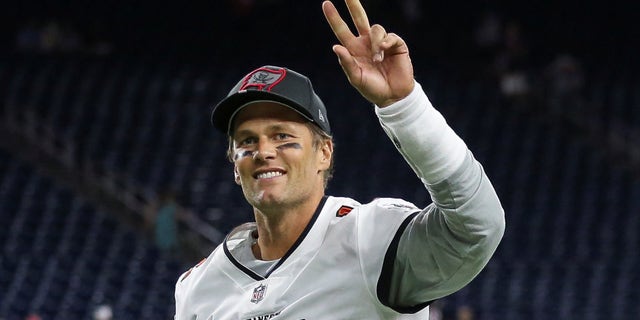 Houston, Texas, USA; Tampa Bay Buccaneers quarterback Tom Brady (12) jogs off the field after a game against the Houston Texans at NRG Stadium.