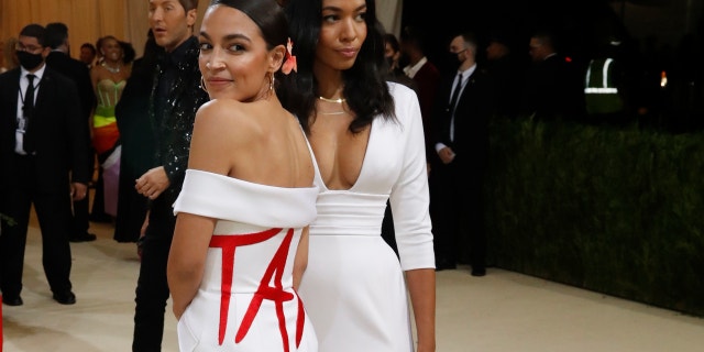 At the Metropolitan Museum of Art Costume Institute Gala, Rep. Alexandria Ocasio-Cortez (D-NY) wears a "Tax The Rich" dress.