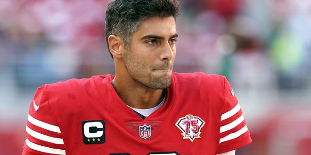 San Francisco 49ers quarterback Jimmy Garoppolo (10) walks on the field before the game against the Green Bay Packers at Levi's Stadium on September 26, 2021.