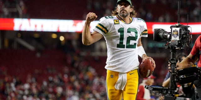 Green Bay Packers quarterback Aaron Rodgers (12) jogs toward the locker room after the Packers defeated the San Francisco 49ers 30-28 at Levi's Stadium in September 2021.